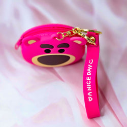 Durable silicone Tom character coin purse and keychain, a unique accessory for kids' bags or keys, combining style and utility. www.usmile.com