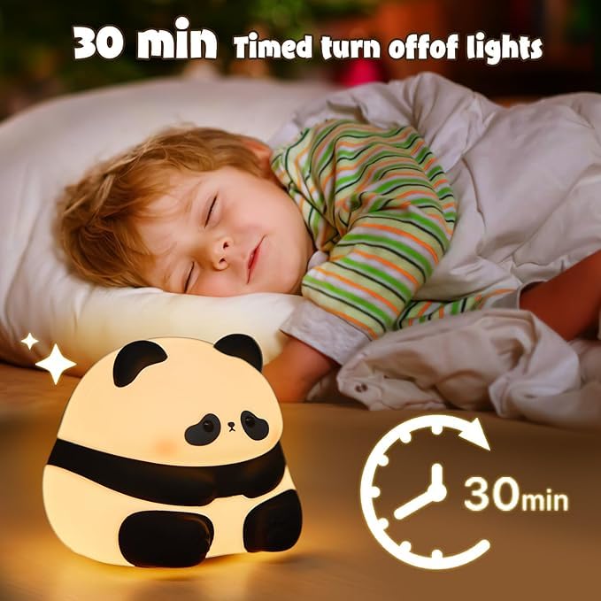 Adorable glowing white and black silicone night lamp for kids, shaped like a baby sitting panda with a sweet expression. Provides a soft, comforting light for bedrooms from uSmile.toys www.usmile.toys