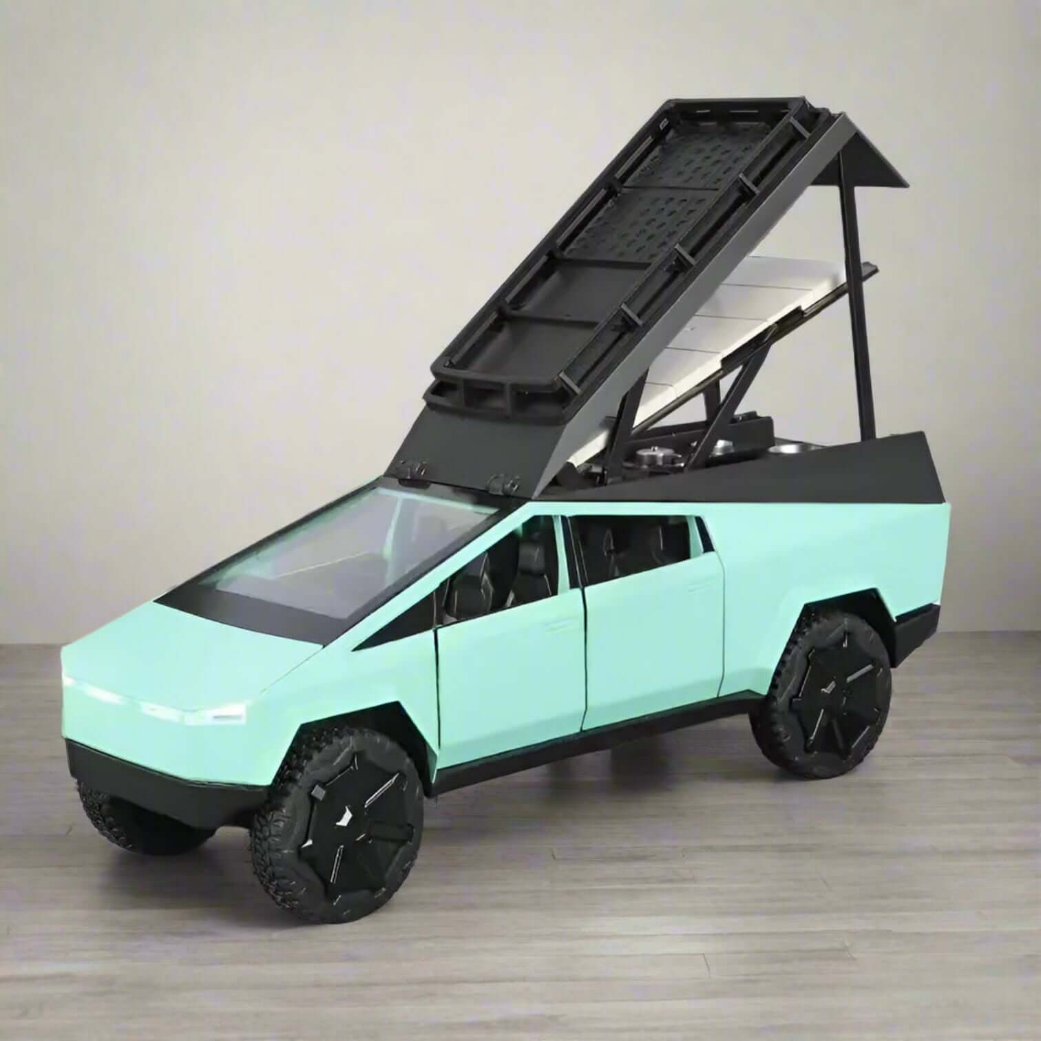 Mint green die-cast Tesla Cybertruck model toy with a functional, opening bed cover, perfect for collectors and imaginative play for kids from Usmile Toys.www.usmile.toys.