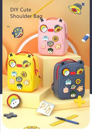 Durable and lightweight EVA material school backpack for young children, in a cheerful yellow hue with cute interchangeable cartoon decorations, offering protection against spills and easy cleaning, available at Usmile Toys.
www.usmile.toys
