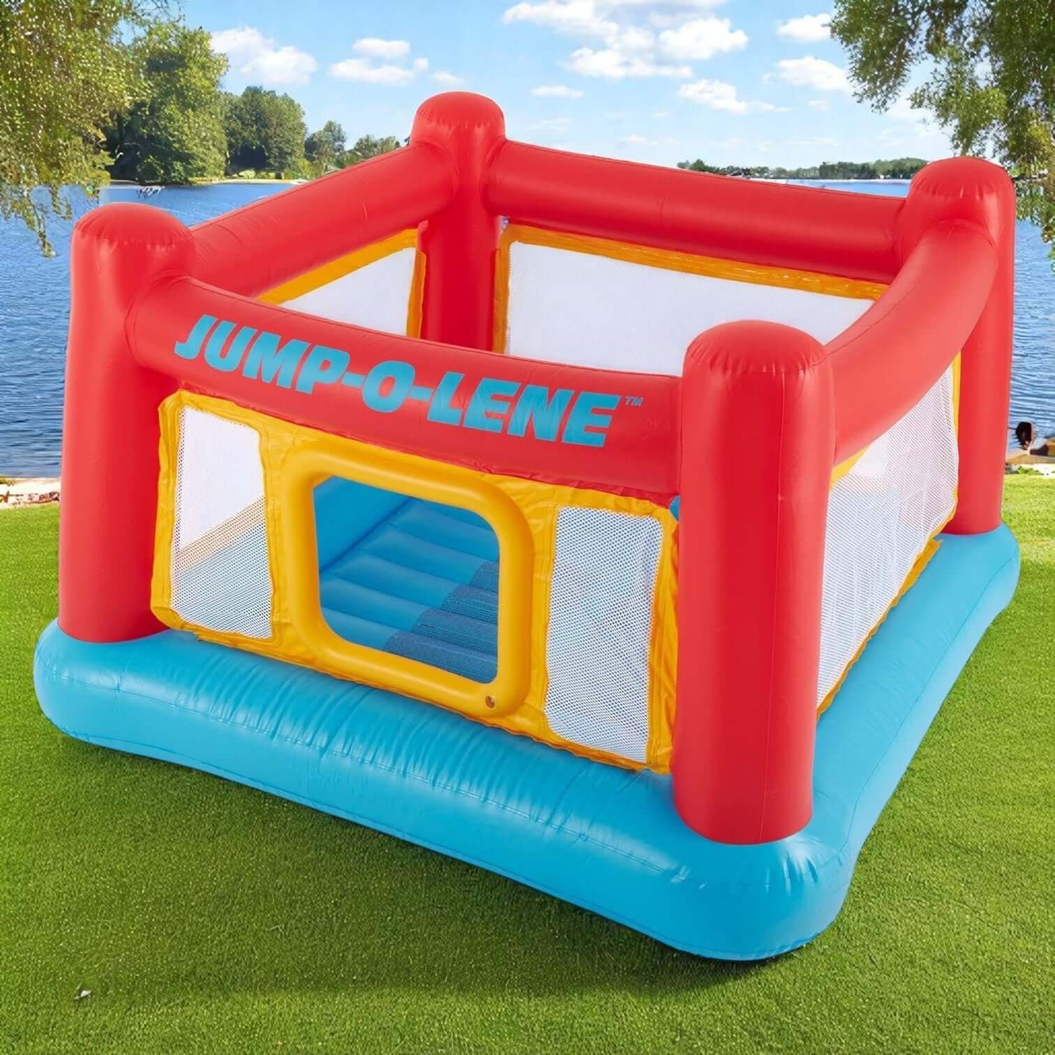 Vibrant red and blue inflatable bouncy play structure for children, featuring transparent mesh sides for visibility, ideal for backyard entertainment and gross motor skill development, from Usmile Toys. www.usmille.toys