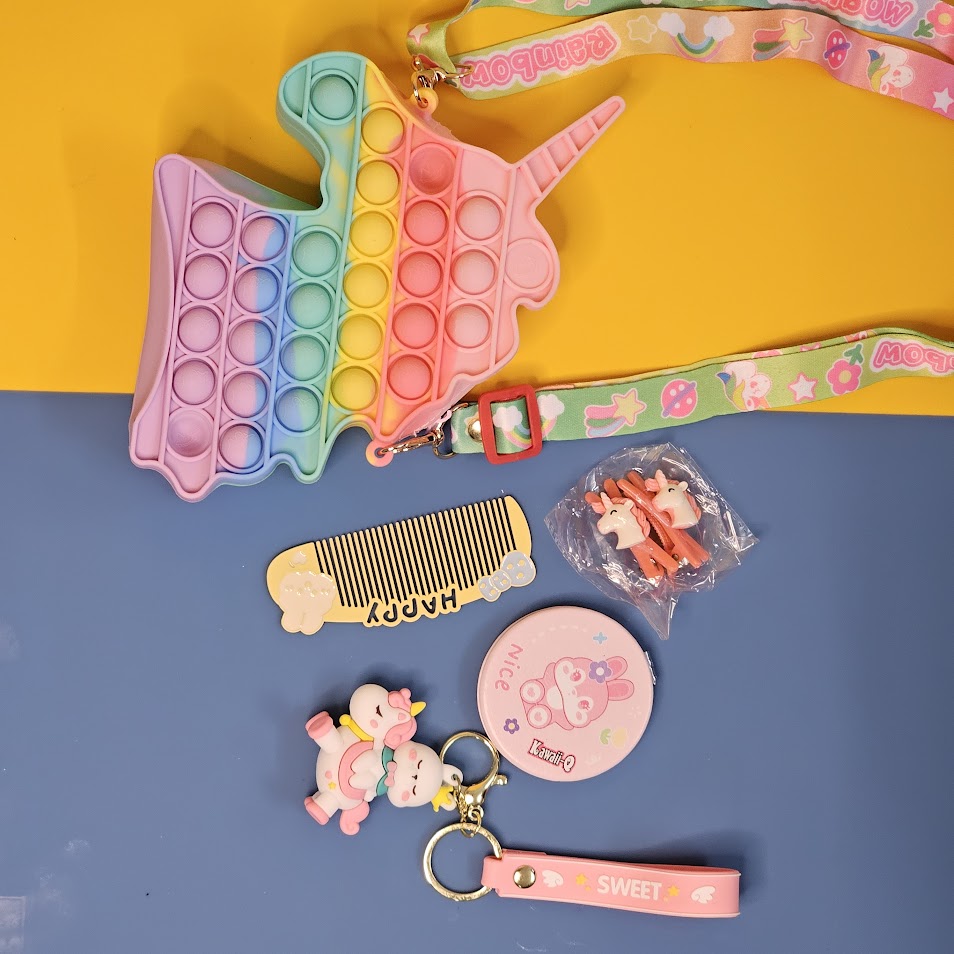 Unicorn Pop It Purse set, a delightful combination of a trendy sensory toy and a cute accessory, perfect for little unicorn lovers! This set, likely featured on www.usmile.toys for its fun