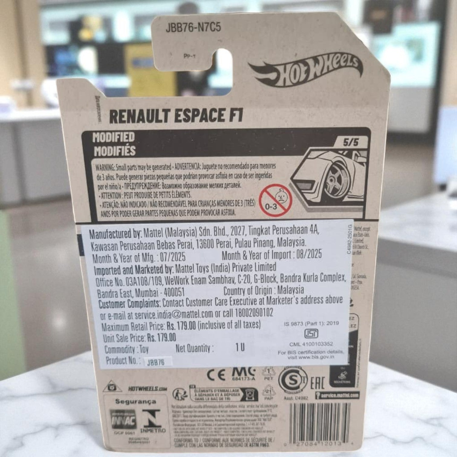 Hot Wheels Renault Espace F1 toy car packaging with detailed text and branding. www.usmile.toys