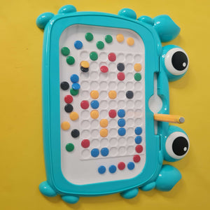 Toy with colorful beads on a yellow background