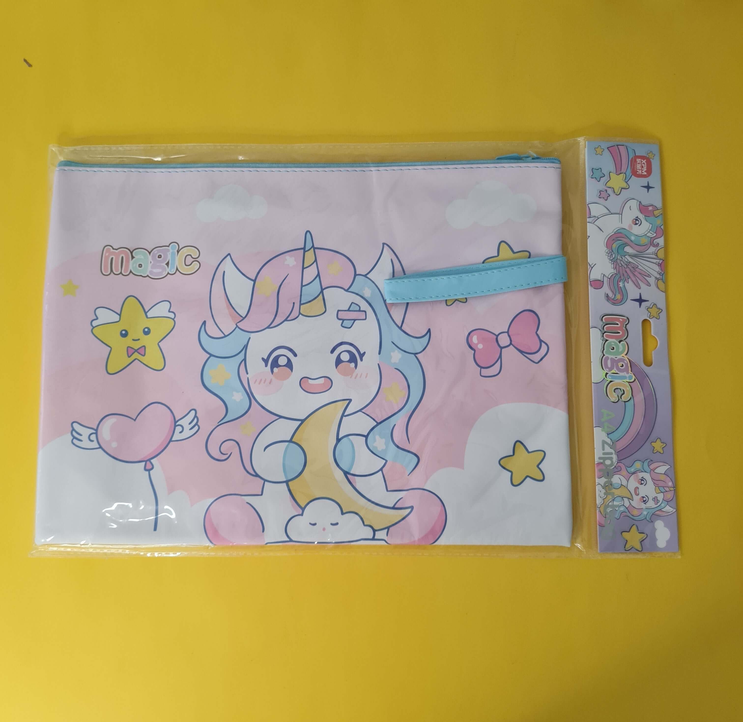 Unicorn-themed pouch with a colorful design on a yellow background