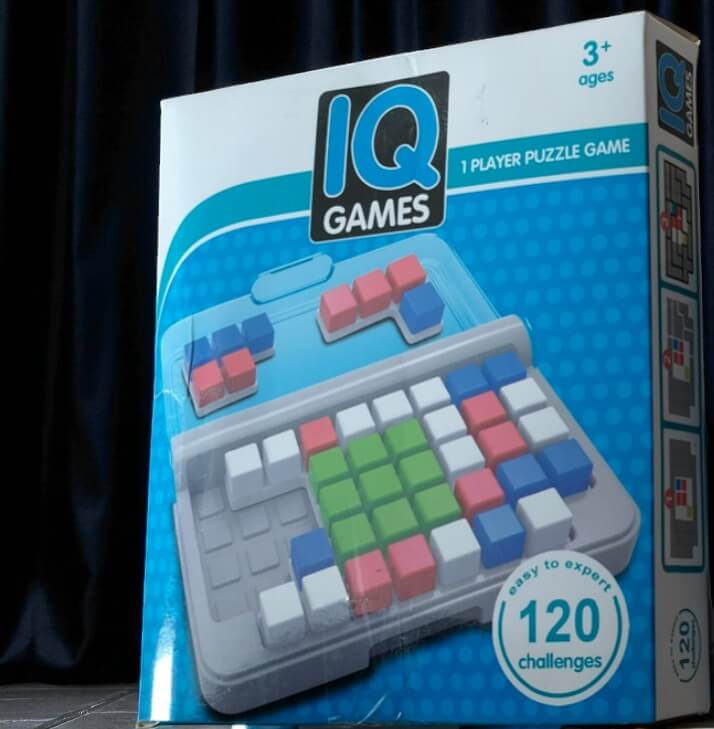U Smile Smart IQ Games Puzzler Pro, a 1-player logic board game with 120 challenges from easy to expert, featuring colorful puzzle pieces and a compact travel case for kids ages 3+. www.usmile.toys