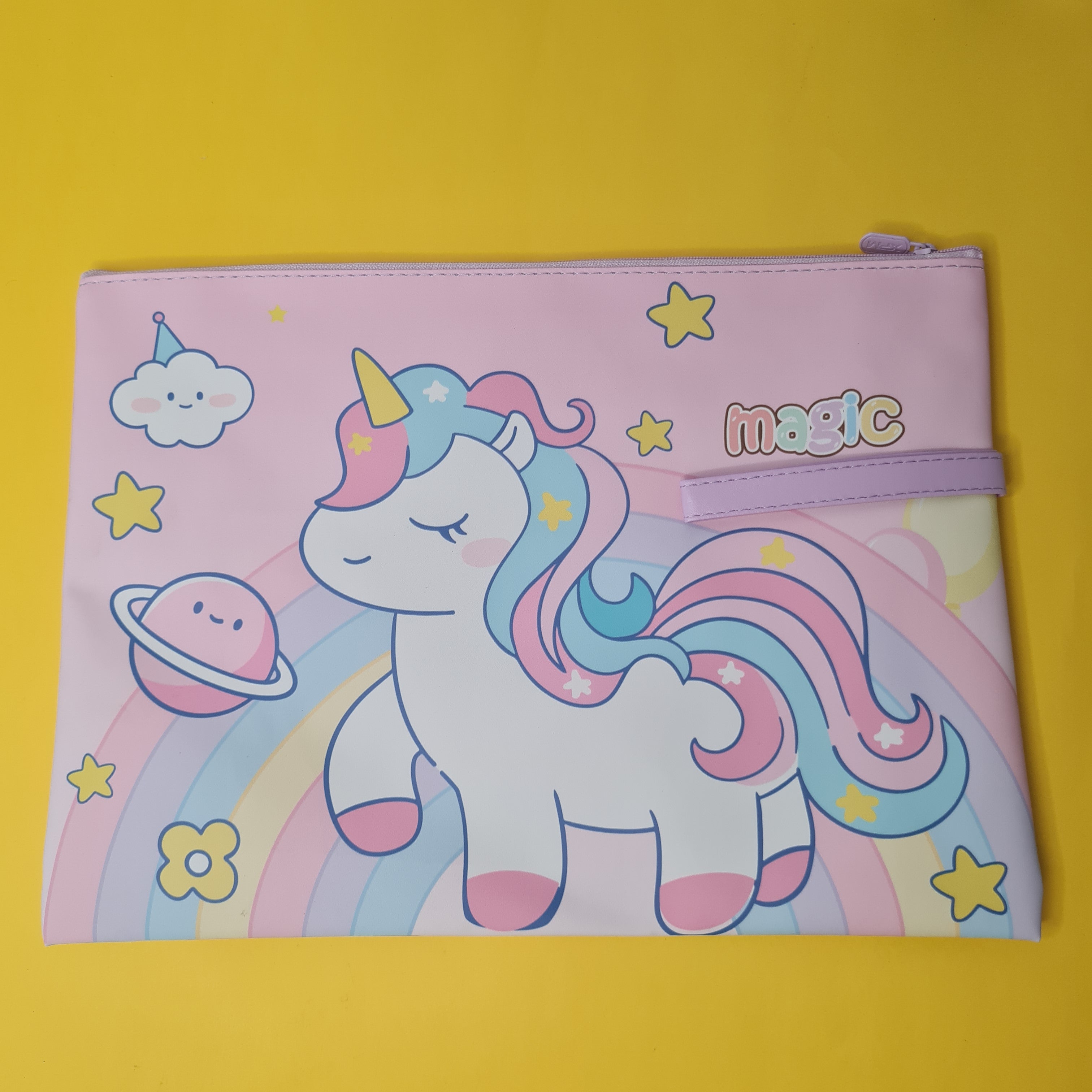 Pink pouch with a unicorn design on a yellow background