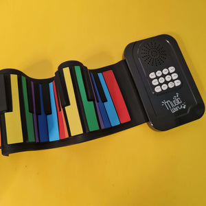 Image showing a 25-key silicone foldable hand roll piano, an electronic music toy perfect for children's learning and portable entertainment from U Smile Toys." www.usmile.toys