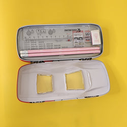 Race car-shaped pencil box for kids – Stylish and durable stationery organizer featuring a red and black sports car design, perfect for school supplies. Ideal gift for children and students."

This ALT text includes relevant keywords like "race car-shaped pencil box," "stationery organizer," "school supplies," and "gift for children" to improve search visibility. Let me know if you want any modifications