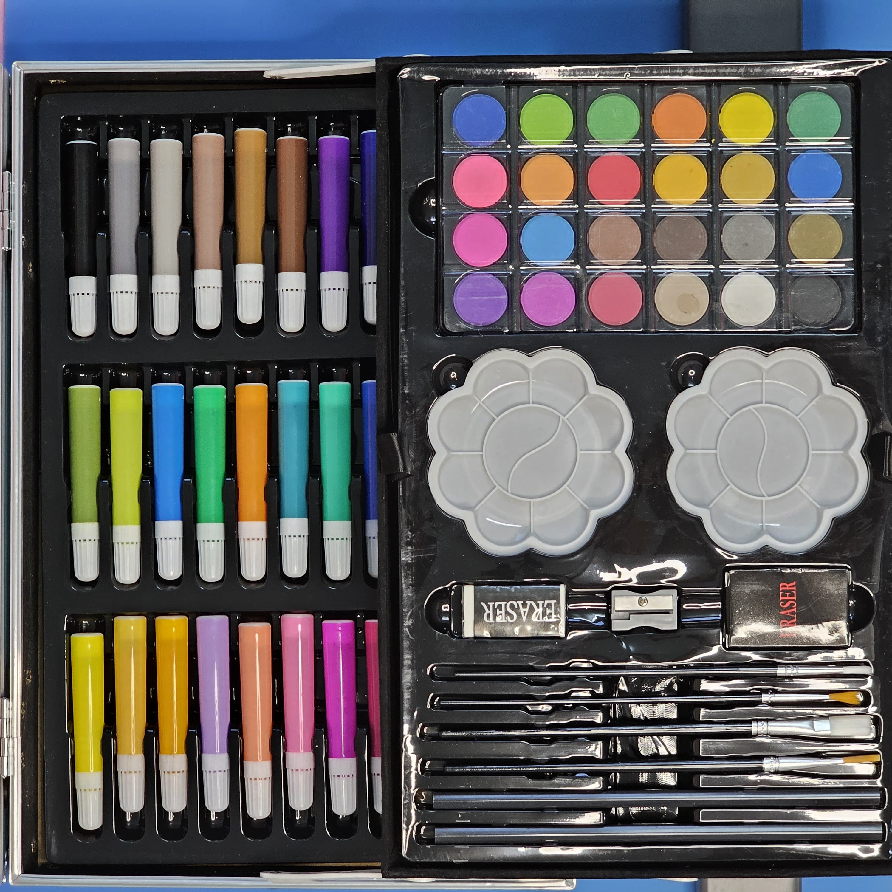 Kids' unicorn art set with markers, crayons, paints, and brushes. Portable art supplies for children, available at usmile.toys