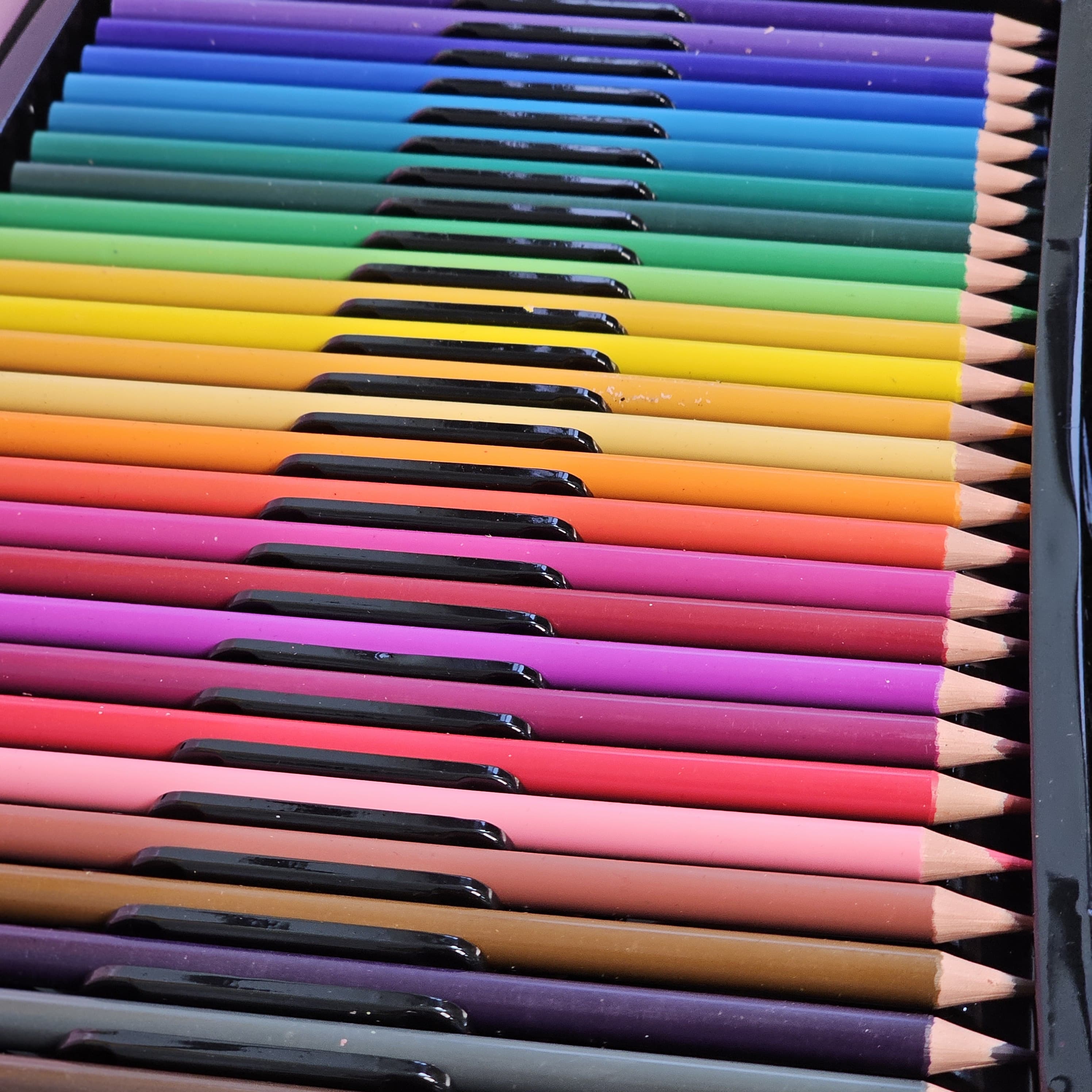 Kids' unicorn art set with markers, crayons, paints, and brushes. Portable art supplies for children, available at usmile.toys