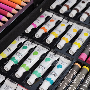 Kids' unicorn art set with markers, crayons, paints, and brushes. Portable art supplies for children, available at usmile.toys