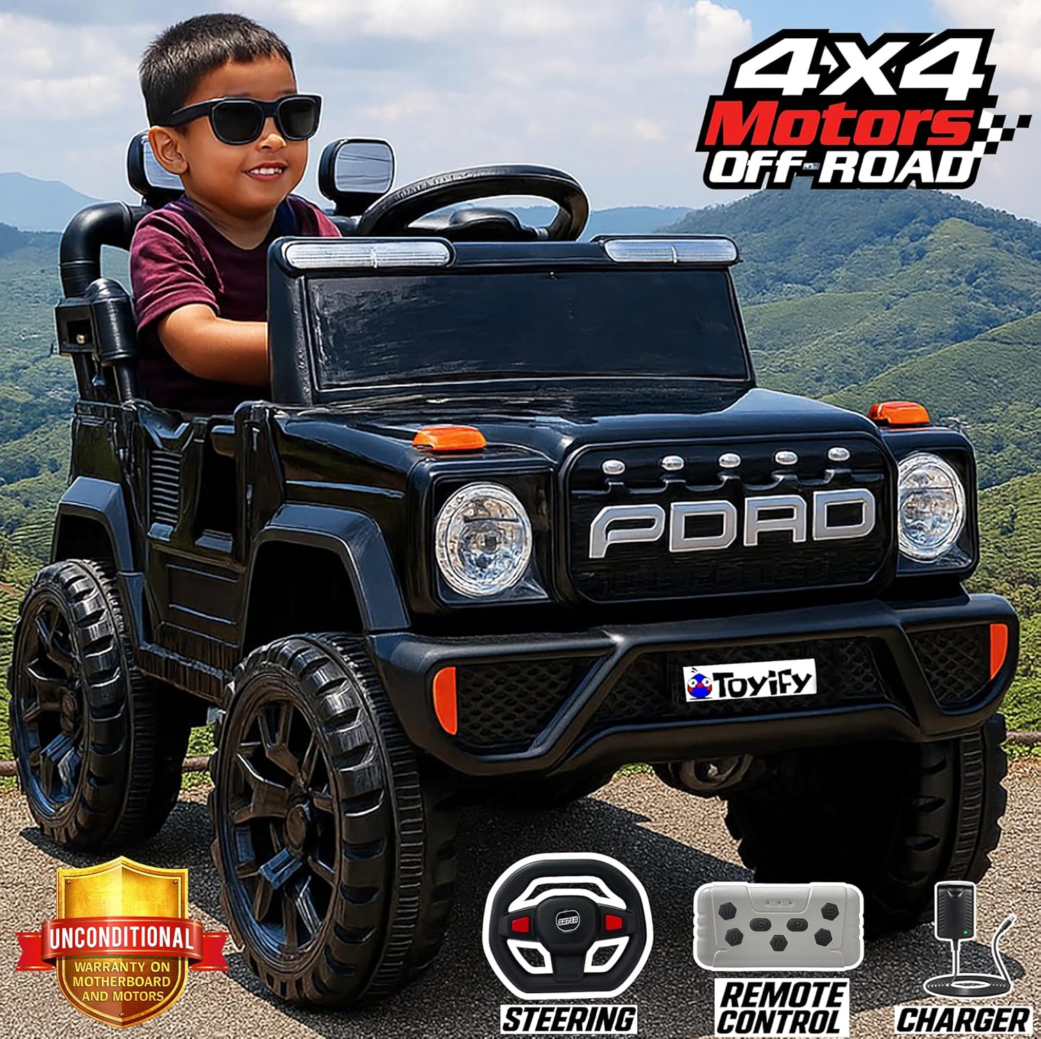 www.usmile.toys_4x4_jeep_for_kids_1_to_6_years_-_Electric_Car_toy_ride_on01 Child in a toy 4x4 vehicle with mountains in the background, featuring Tovvity branding.