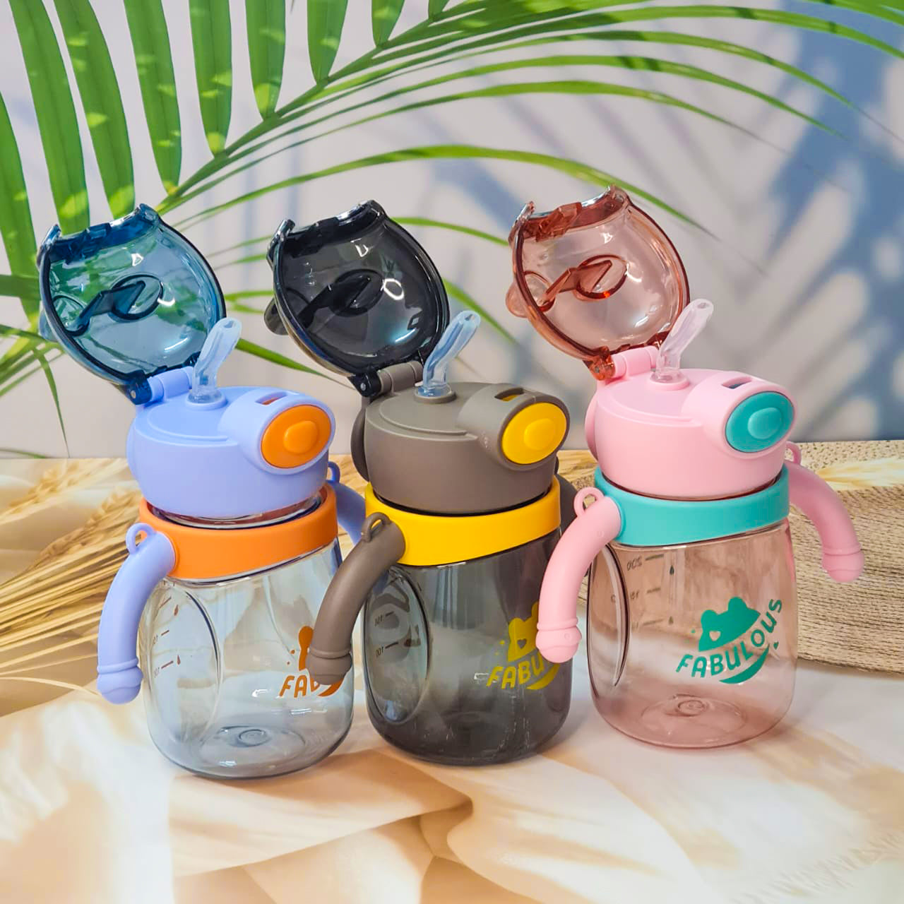 Three plastic water bottles designed with bear motifs, each with a carrying strap and handles in various colors.