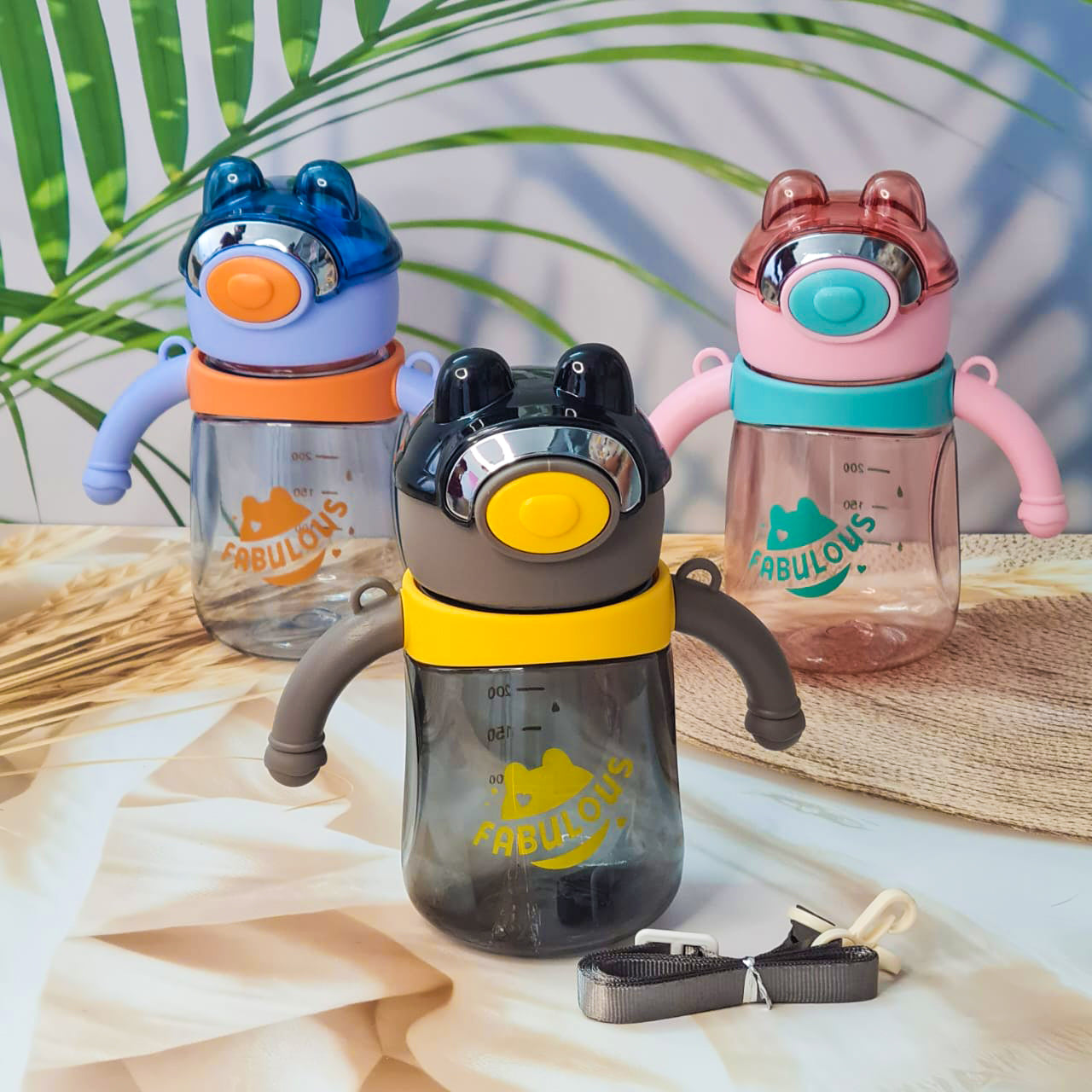 Three plastic water bottles designed with bear motifs, each with a carrying strap and handles in various colors.
