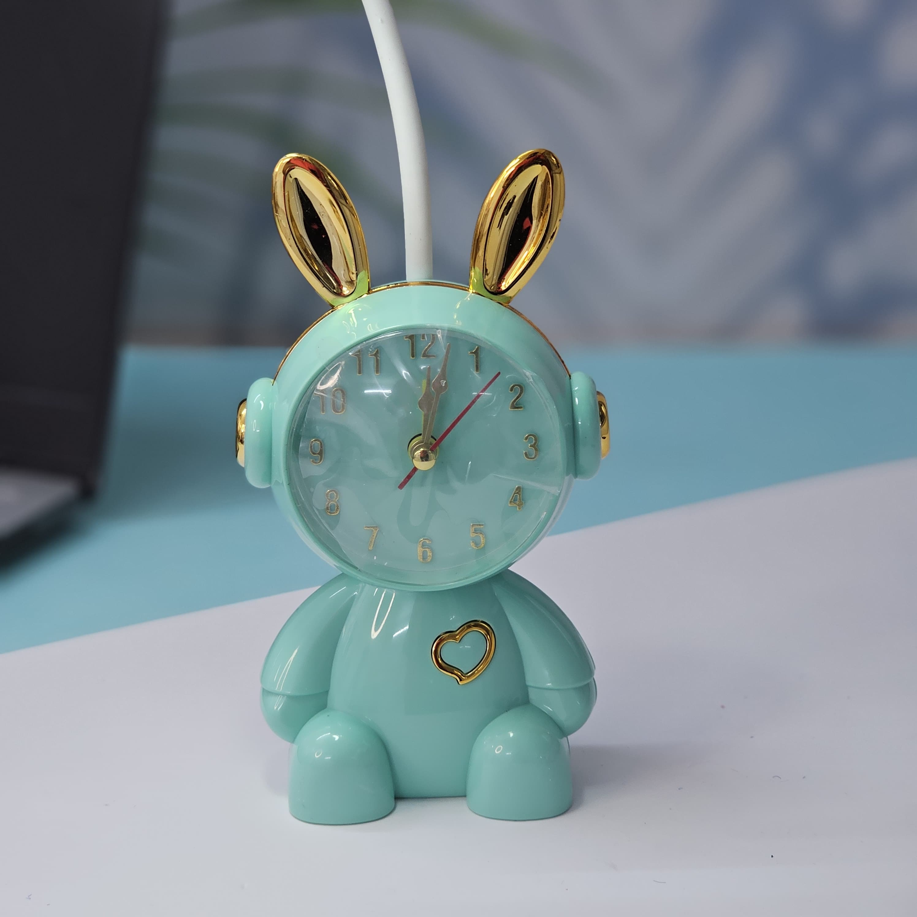 The perfect gift for kids or nursery decor: Usmile Toys cute pink bunny alarm clock with a gentle moon night light. This charming timepiece helps little ones learn to tell time while offering comforting bedtime lighting.
