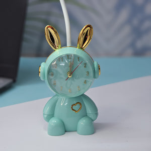 The perfect gift for kids or nursery decor: Usmile Toys cute pink bunny alarm clock with a gentle moon night light. This charming timepiece helps little ones learn to tell time while offering comforting bedtime lighting." www.usmile.toys