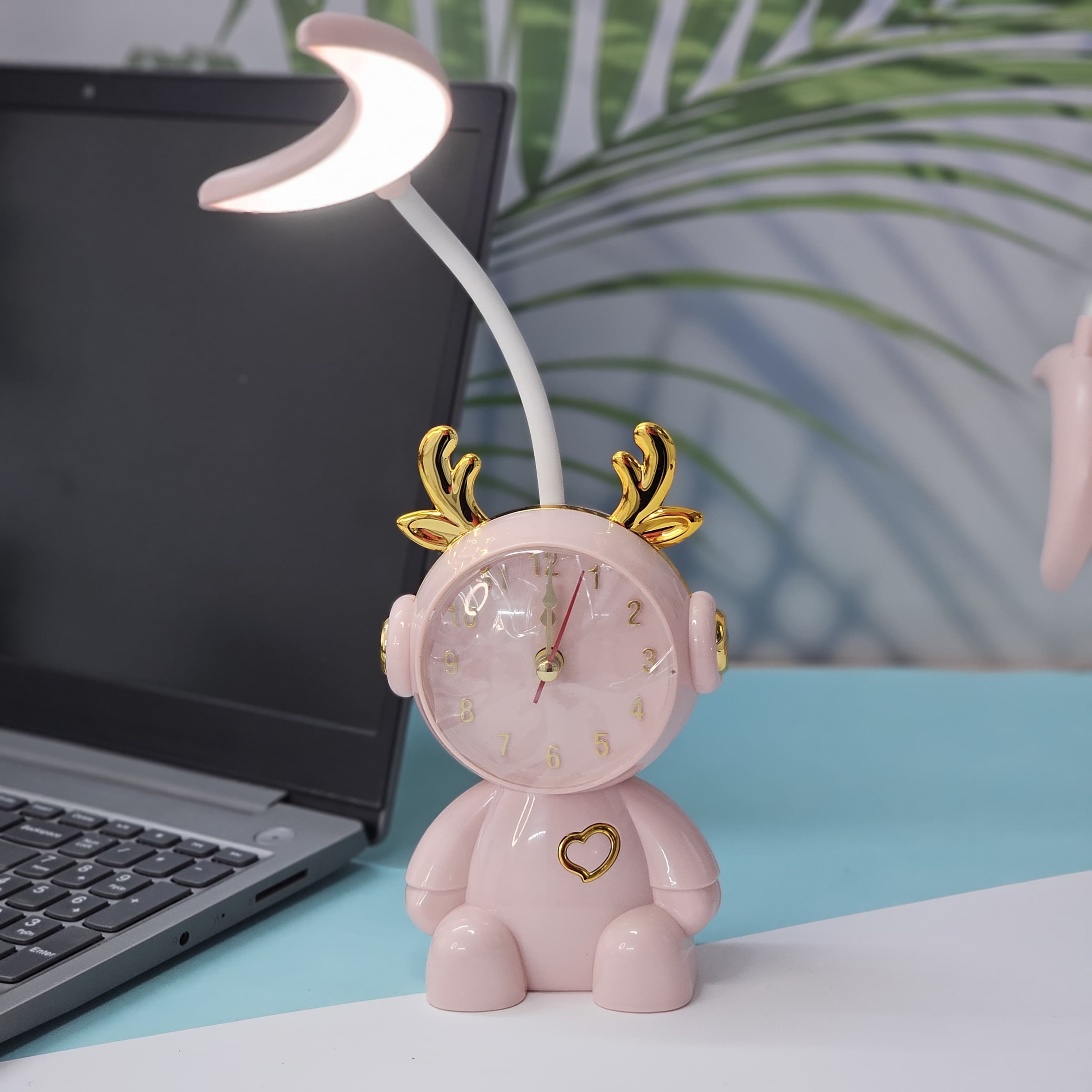 Buy the Usmile Toys adorable pink bunny clock with moon night light for your child's room. This fun alarm clock and soft lamp helps create a soothing bedtime routine." www usmile.toys