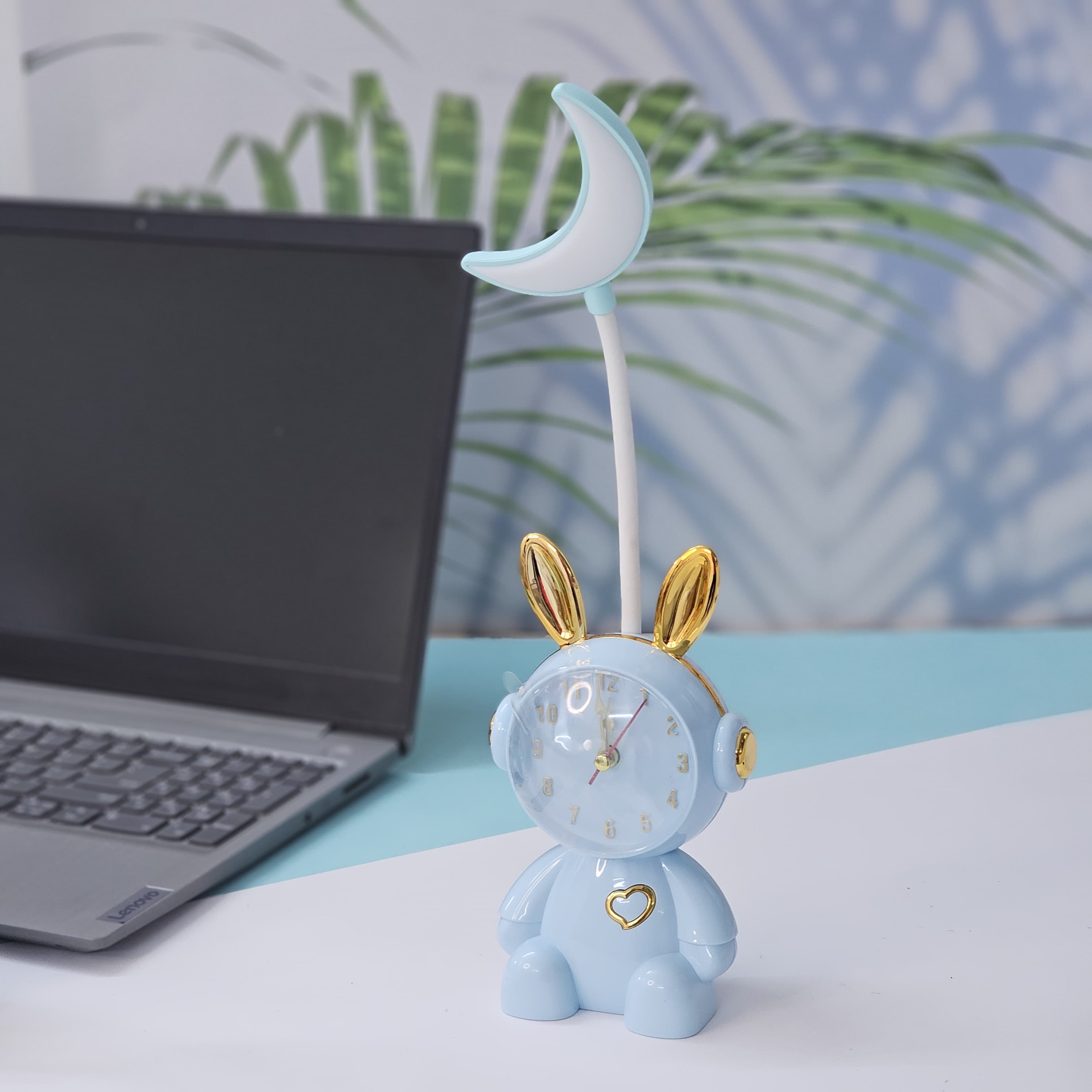 Buy the Usmile Toys adorable pink bunny clock with moon night light for your child's room. This fun alarm clock and soft lamp helps create a soothing bedtime routine." www.usmile.toys