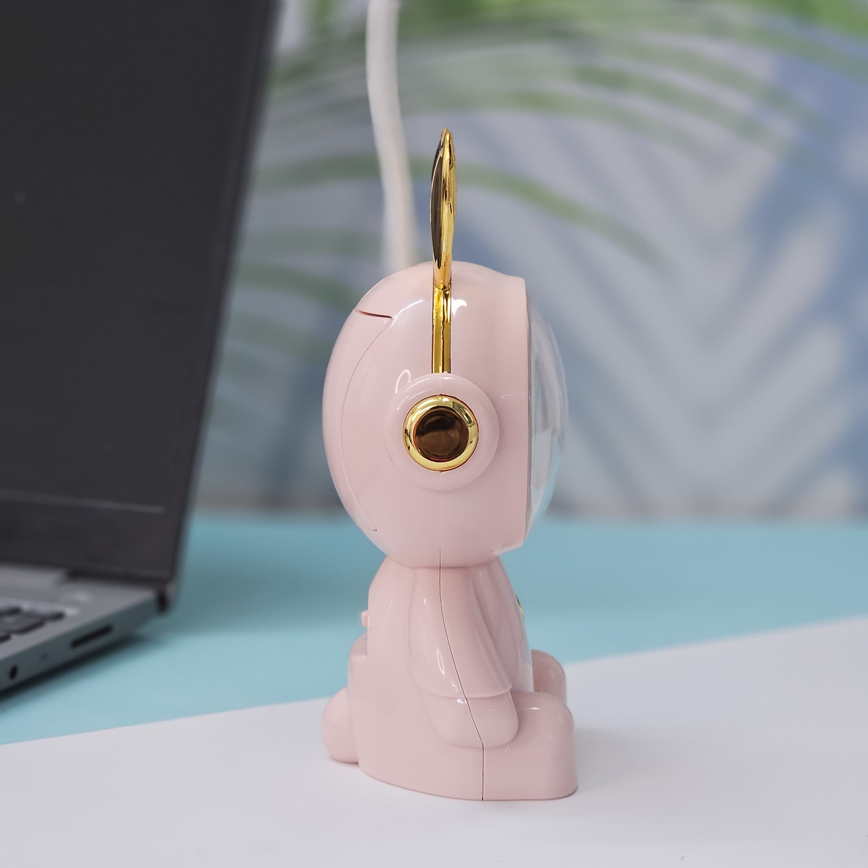 Buy the Usmile Toys adorable pink bunny clock with moon night light for your child's room. This fun alarm clock and soft lamp helps create a soothing bedtime routine." www.usmile.com