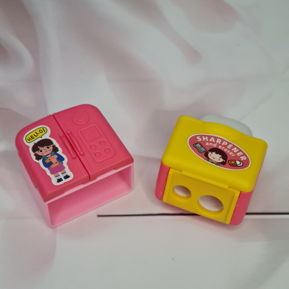 Usmile Toys fun school supplies: a collection of colorful mini fridge-shaped sharpeners with 'SHARPENER' text and sweet cartoon figures." www.usmile.toys