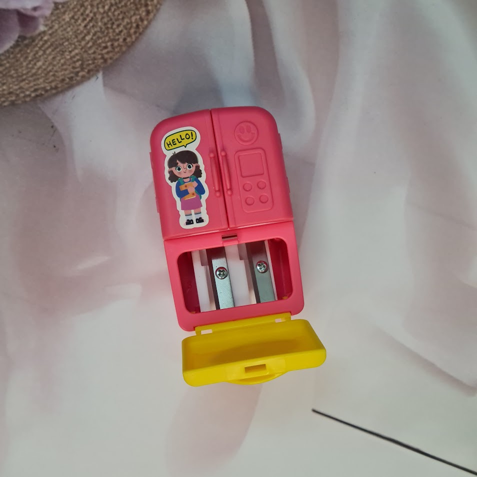 Usmile Toys fun school supplies: a collection of colorful mini fridge-shaped sharpeners with 'SHARPENER' text and sweet cartoon figures." www.usmile.toys