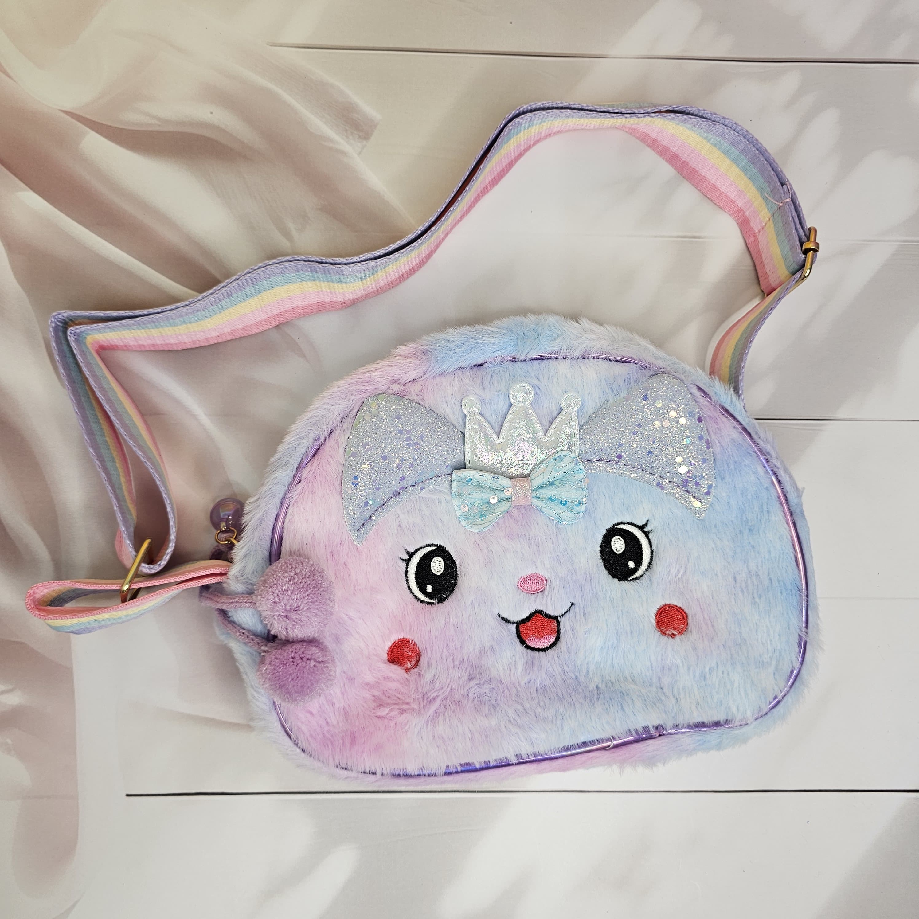 Find this cuddly and stylish kids' crossbody bag and other girls' fashion items at Usmile Toys www.usmile.toys.
