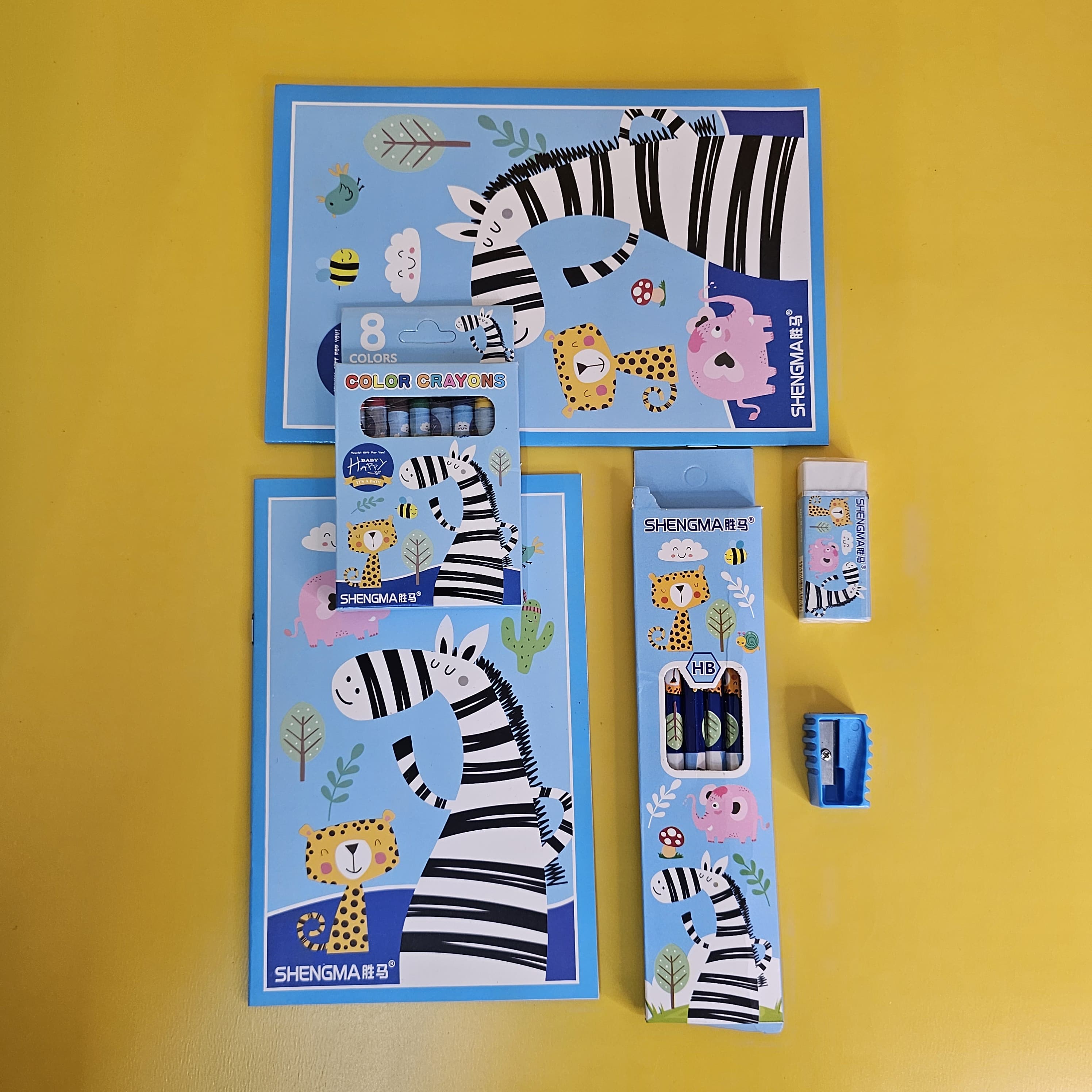  This kit includes notebooks with zebras and lions, perfect for school and drawing.
www.usmile.toys