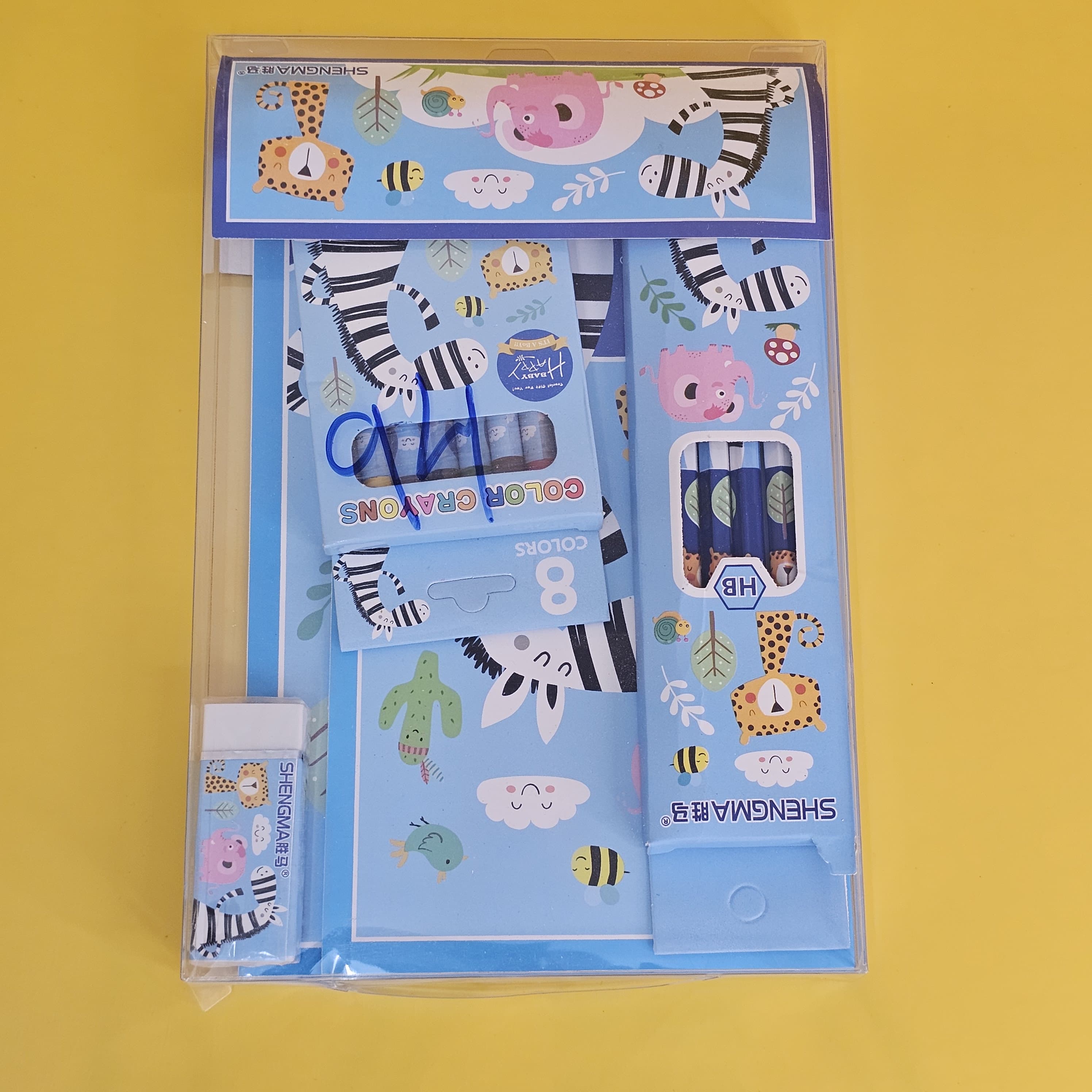 Engaging animal-themed stationery kit for young learners, including notebooks, HB pencils, eraser, sharpener, and 8 colour crayons, available in www.usmile.toys
