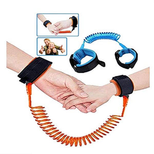 Close-up of a vibrant blue child safety wrist link, showing soft, adjustable cuffs on two wrists and a strong, flexible coiled tether, ideal for preventing children from wandering off, from Usmile Toys. www.usmile.toys