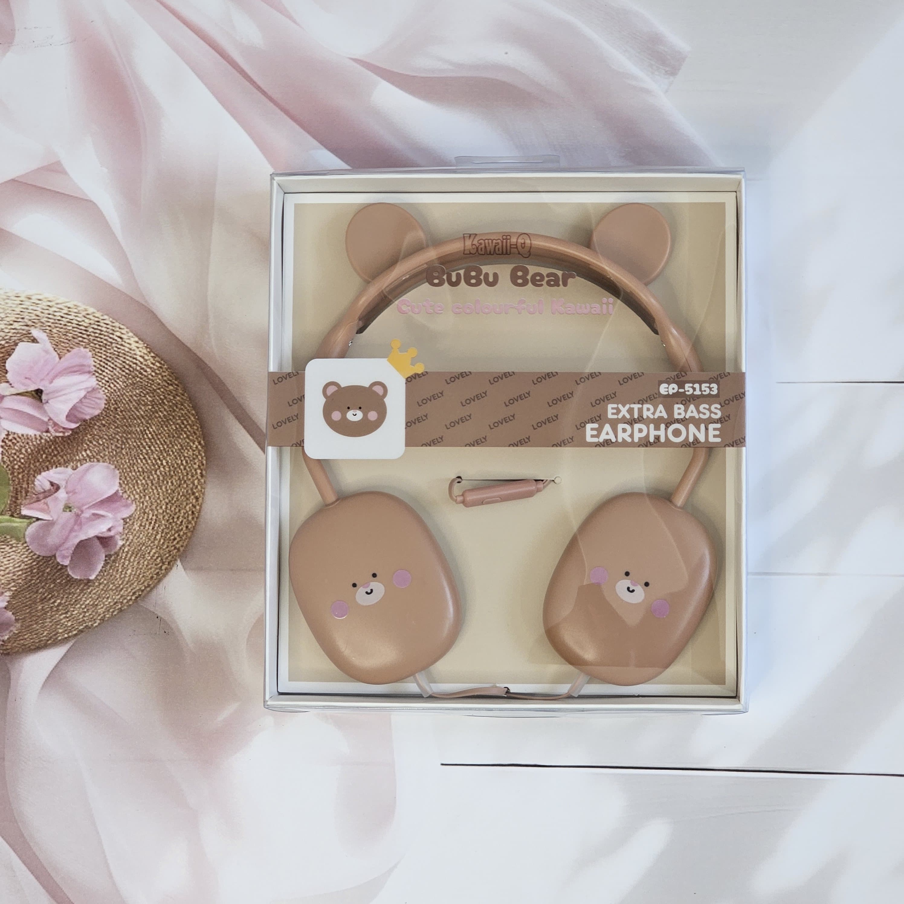 ute Rabbit wired headphones with bear face design on earcups, in a soft pink color, displayed on a white surface.           www.usmile.toys