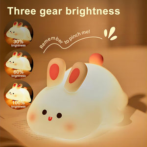 "Give a calming glow with this sweet silicone rabbit night light, perfect for kids' bedrooms. Its cute big face and soft material make it an ideal companion for bedtime from uSmile.toys www.usmile.toys