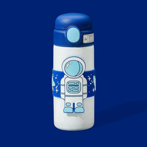 White stainless steel insulated water bottle for kids with a blue cap and a wrap-around blue band featuring an astronaut and space designs. 500 ML capacity. Ideal for hot or cold beverages for school and travel from uSmile.toys." www.usmile.toys