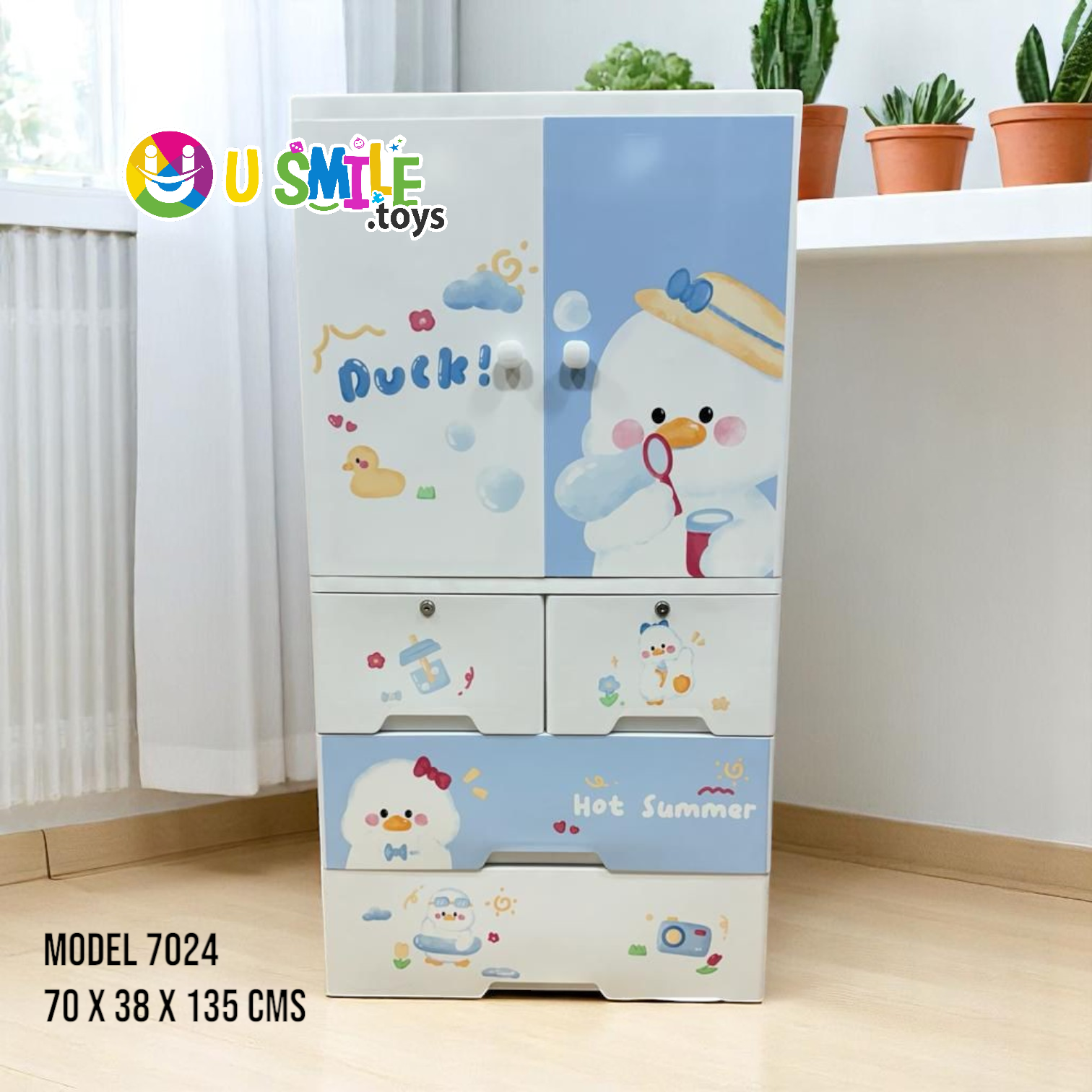 Bubby Ducky Baby Wardrobe (Almari) in white and light blue, featuring adorable cartoon duck illustrations. This plastic cupboard with multiple drawers and double doors measures 70 x 38 x 135 cm, perfect for nursery storage and organizing baby clothes on usmile.toys. www.usmile.toys