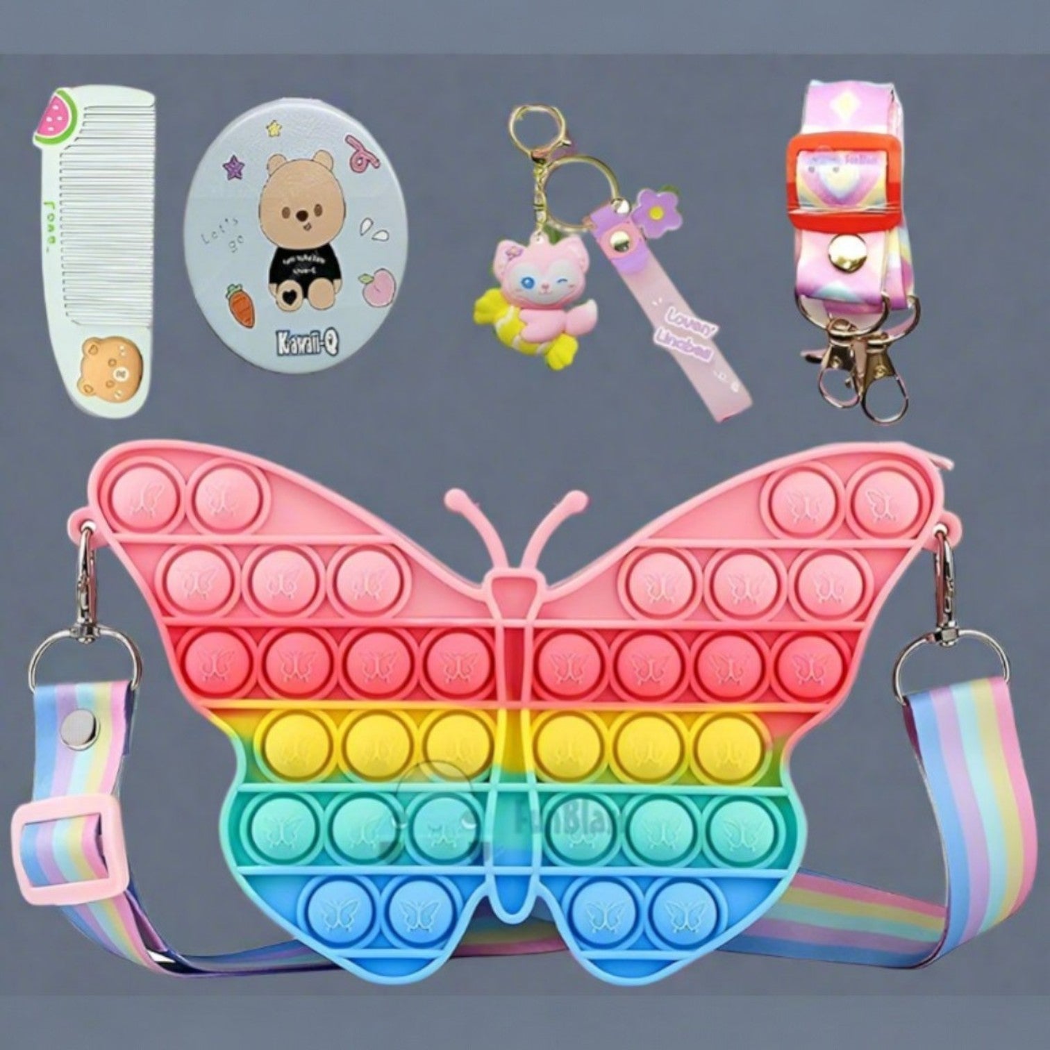 Usmile Toys Kids' rainbow butterfly Pop It fidget sling bag, featuring vibrant colors, shown with matching comb and character keychains." www.usmile.toys