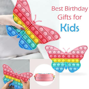 Front view of a Usmile Toys girls' crossbody purse, shaped like a rainbow butterfly Pop It fidget toy, with a striped strap and accompanying accessories."