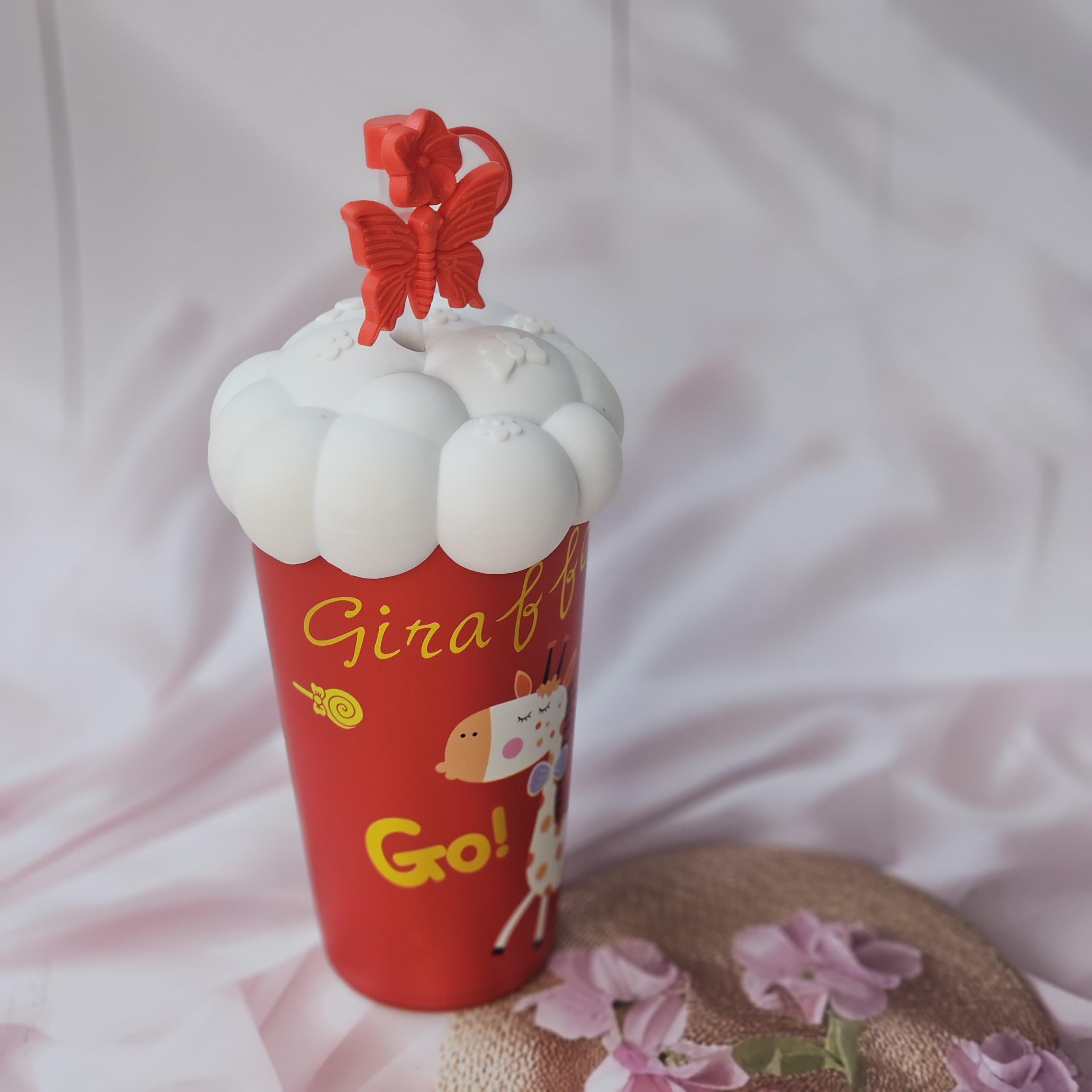 Set of five colorful Usmile Toys Cartoon Insulated Fancy Sippers for kids, each with unique animal or character designs and whimsical cloud-shaped lids with decorative straw toppers."