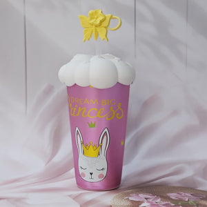 Usmile Toys 'Fun & Functional' kids' drinkware: a mix of insulated cartoon tumblers in blue, green, pink, red, and purple, featuring a pug, donut, bunny, giraffe, and girl design respectively, all with white cloud lids." www.usmile.toys