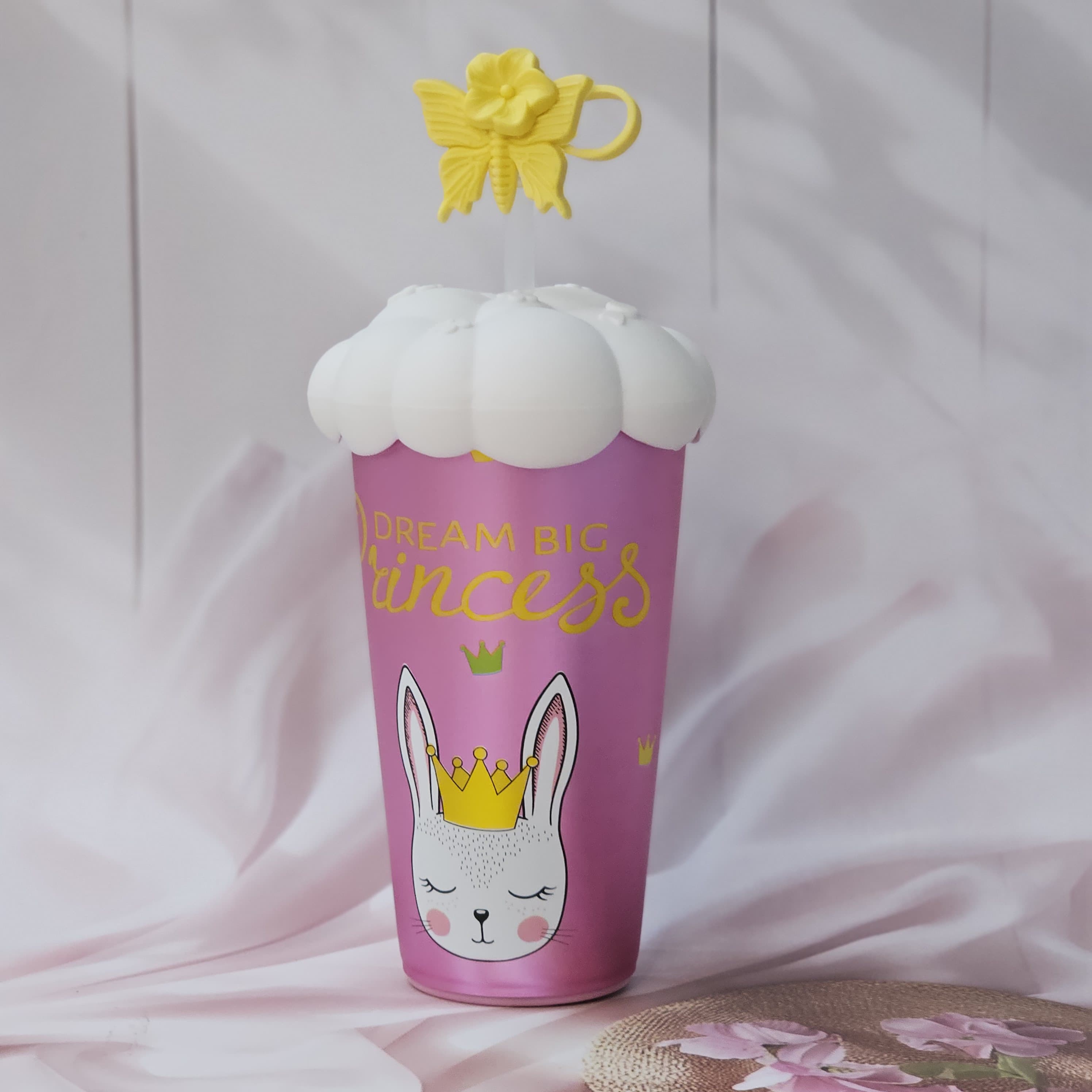 Usmile Toys 'Fun & Functional' kids' drinkware: a mix of insulated cartoon tumblers in blue, green, pink, red, and purple, featuring a pug, donut, bunny, giraffe, and girl design respectively, all with white cloud lids." www.usmile.toys