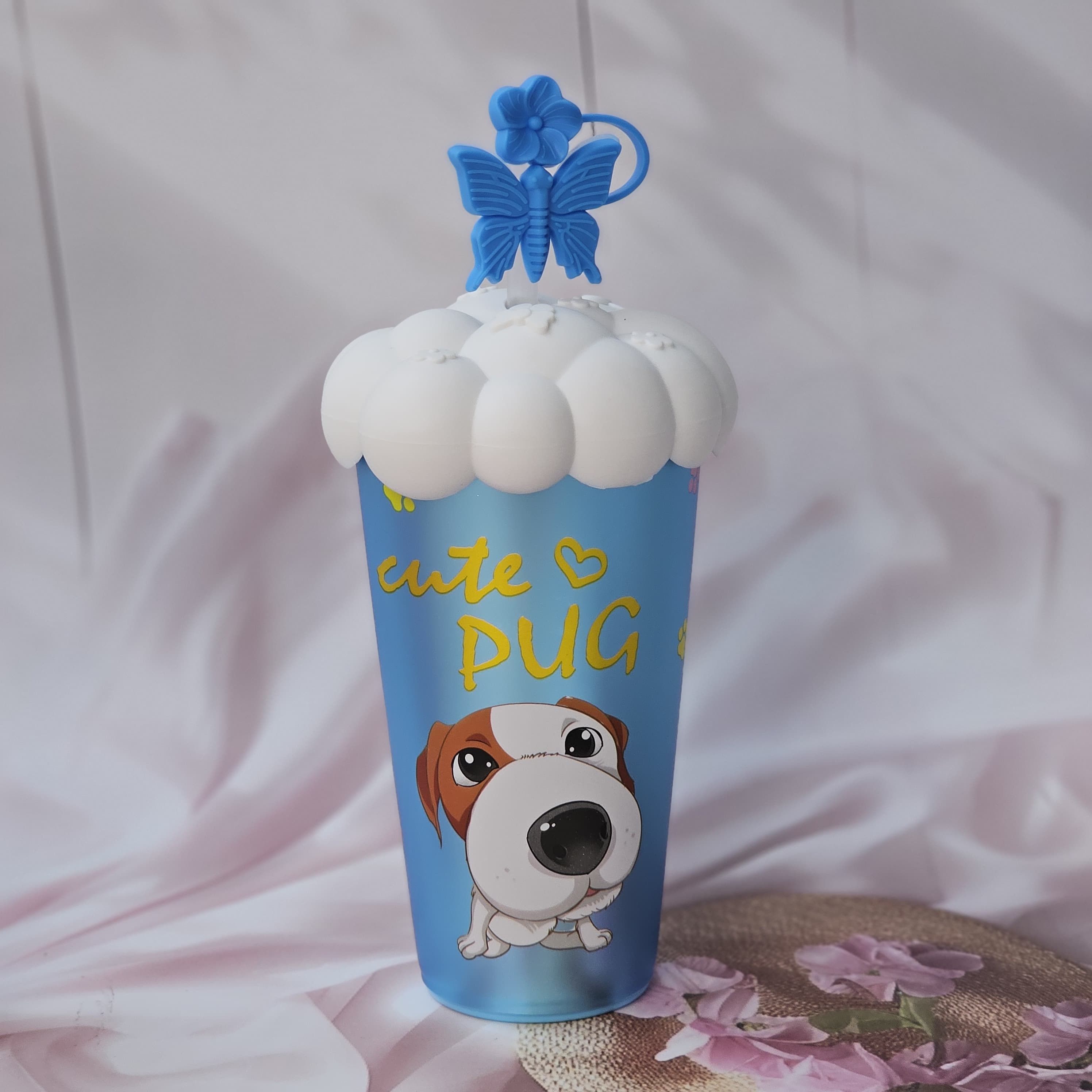 Set of five colorful Usmile Toys Cartoon Insulated Fancy Sippers for kids, each with unique animal or character designs and whimsical cloud-shaped lids with decorative straw toppers."