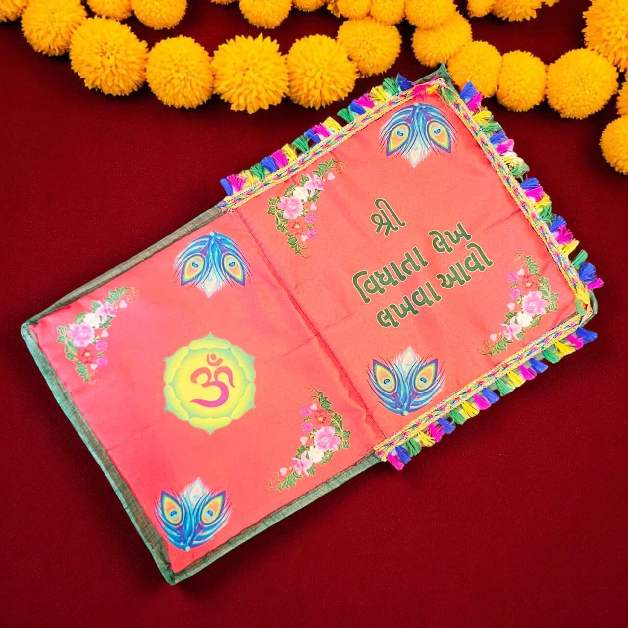 Decorative book with colorful designs on a red background