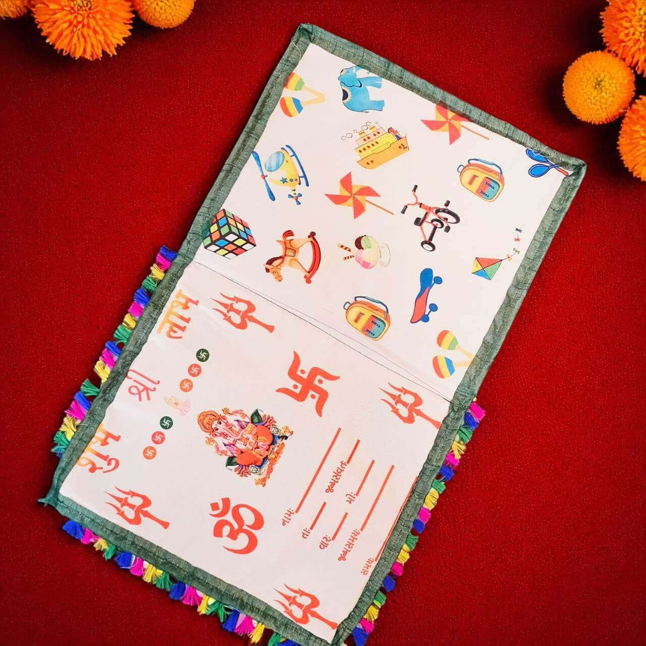 Colorful fabric with cartoon designs on a red background