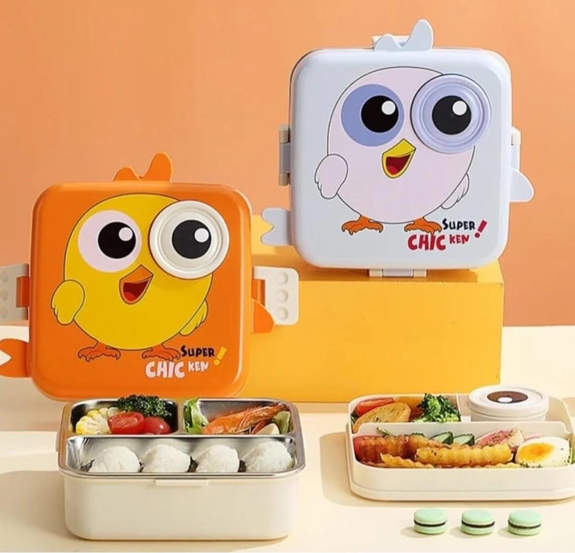 Durable SS insulated kids bento boxes with cheerful chicken characters, featuring multiple compartments and secure clips for school meals.SS insulated kids bento boxes with cheerful chicken characters, featuring multiple compartments and secure clips for school meals. www.usmilke.toys