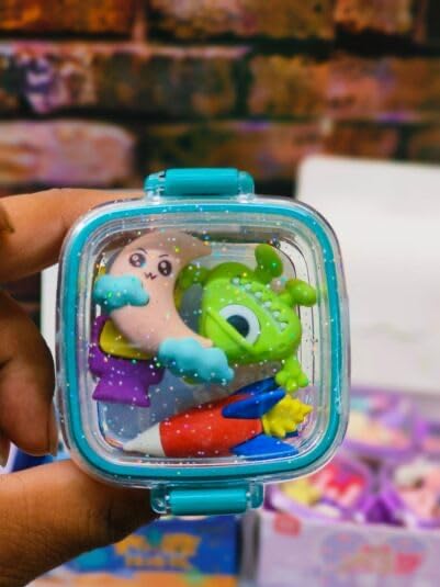 Fun, colorful erasers in animal and space shapes, packaged in small, square bento boxes. www.usmile.toys