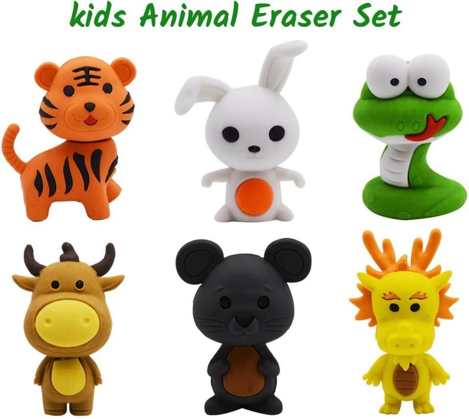 Set of six animal erasers including a tiger, rabbit, snake, cow, bear, and lion on a white background.