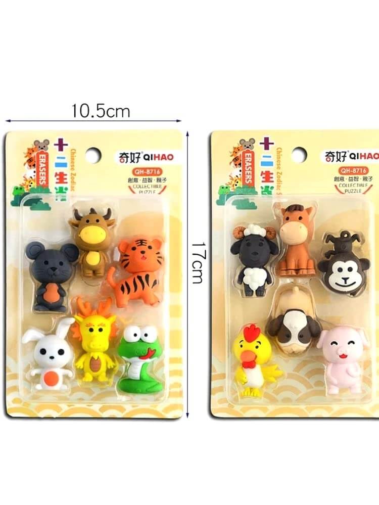 Two packages of cartoon animal figurines with measurements on a white background