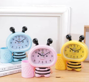 Cute Bee Shaped Alarm Clock: Includes a pen cup for stationery. Fun and practical desk accessory.
www.usmile.toys