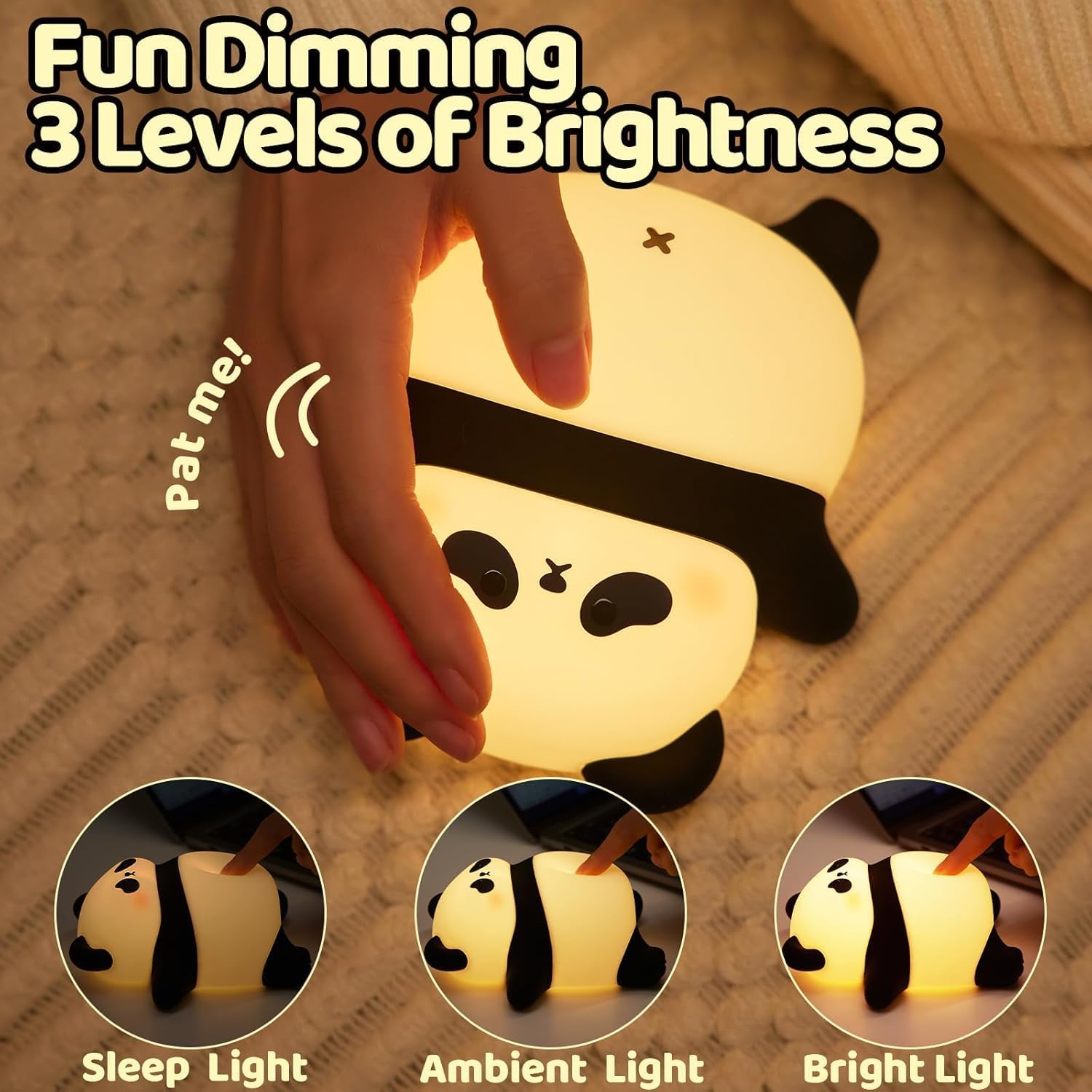 Adorable glowing white and black silicone night lamp for kids, shaped like a cute lying panda, illuminating a surface. Ideal for a comforting and soft light in a child's bedroom from uSmile.toys." www.usmile.toys