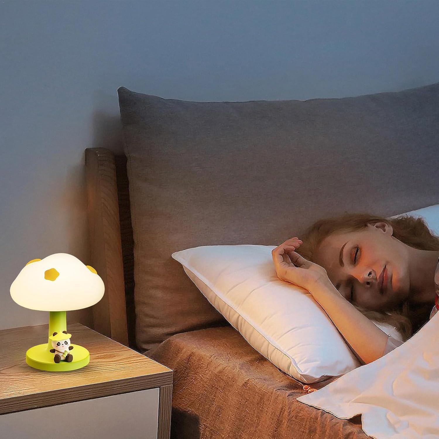 Add a charming and soft glow to any child's bedside with this adorable PoPo Panda silicone table lamp, perfect for bedtime stories and creating a comforting atmosphere. Find it at uSmile.toys." www.usmile.toys