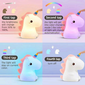 White silicone unicorn night light with colorful horn, perfect for children's rooms www.usmile.com
